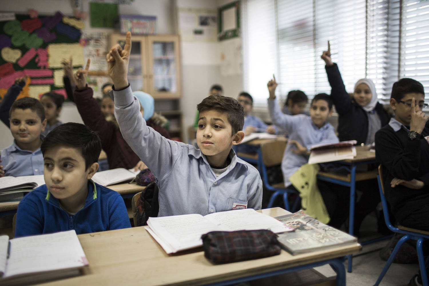 Syrian and Lebanese students sit together in classes at the Mohammed Shamel mixed Elementary public school in Tariq el Jdideh, Beirut, Lebanon. Adam Patterson/Panos/DFID via Flickr